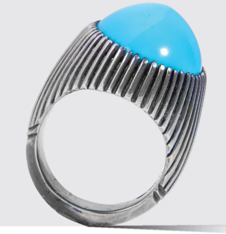 A Spinella ring with a blue stone
