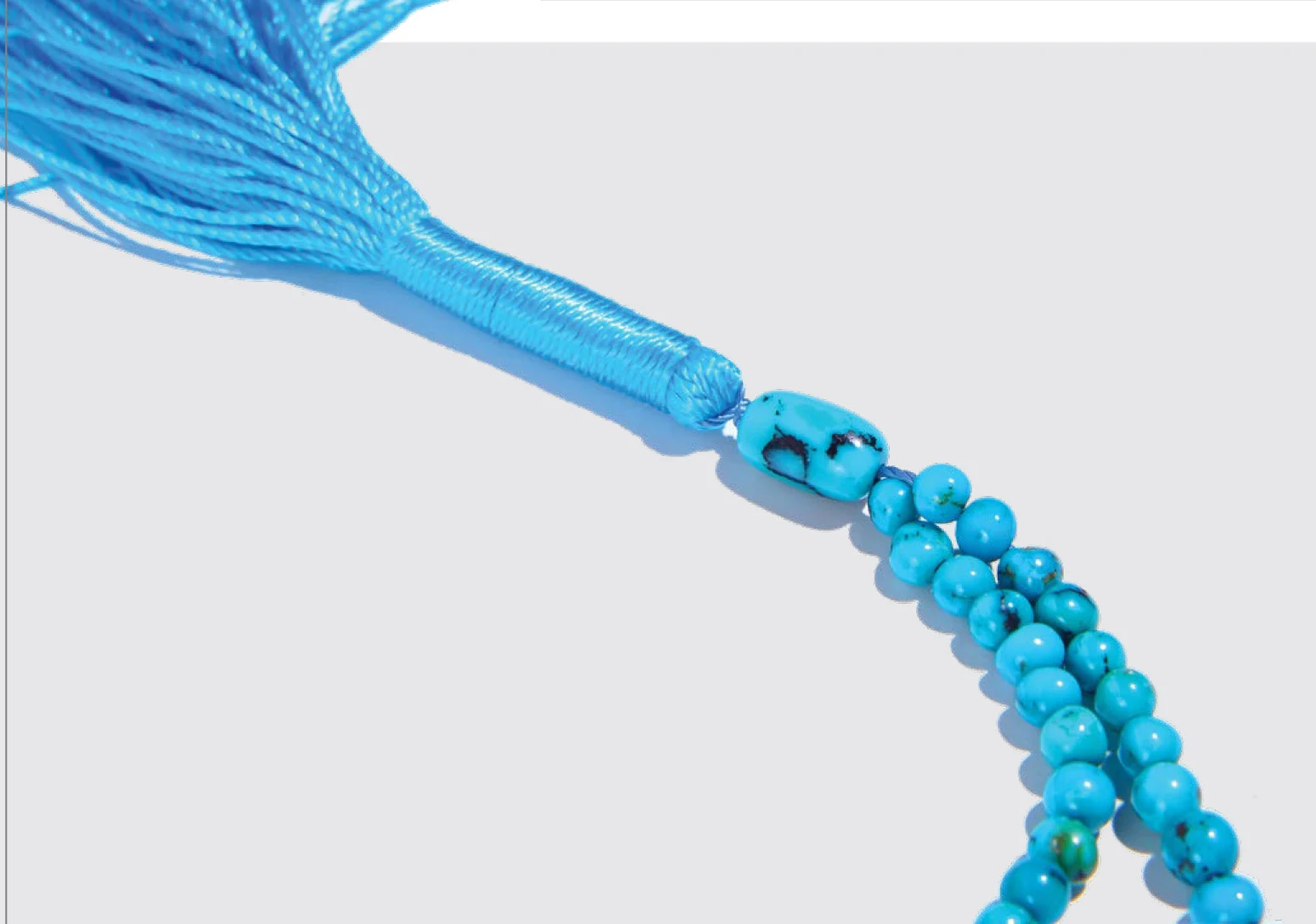 A Spinella tasbih with blue beads